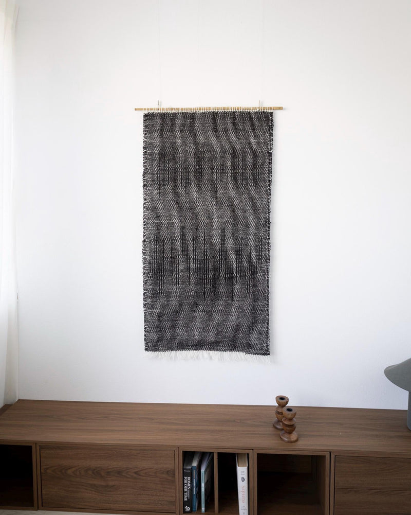 Nyora handwoven wall hanging, full length in a styled bright interior — minimalist textile art by Lale Studio & Shop