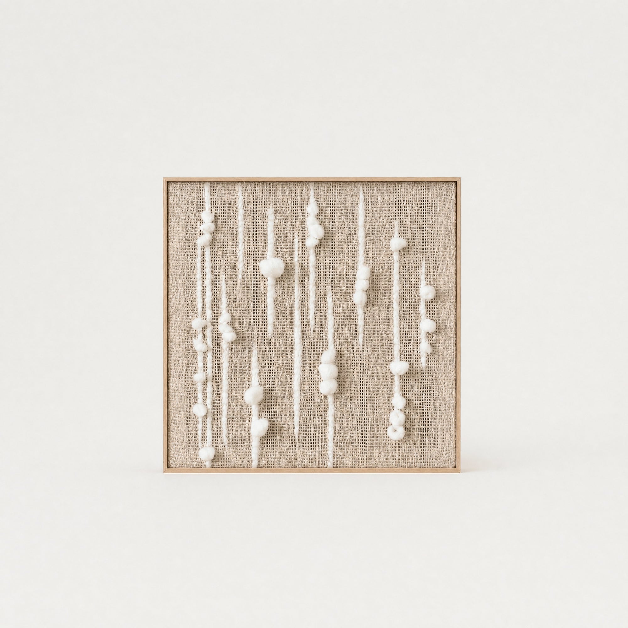 Olit minimalist square handwoven two-ply wool tapestry in natural cream in a slim pine frame, framed textile wall art by Lale Studio & Shop
