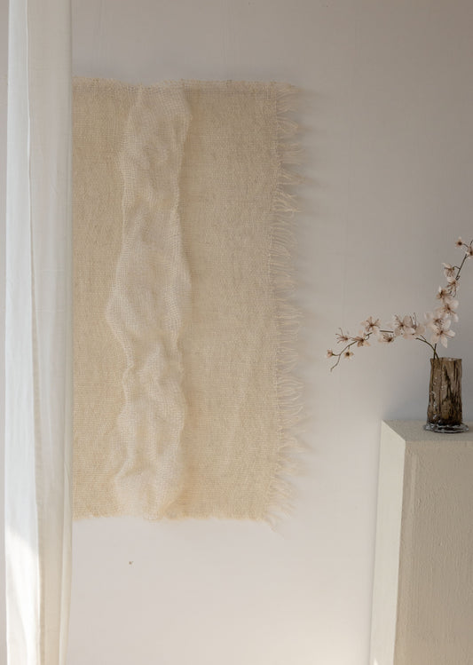 Side view of Perfecta showing its handwoven wool depth