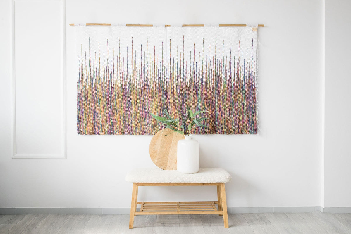 Rainbow large handwoven colourful wall hanging in vivid rainbow yarn with white fringe, by Lale Studio & Shop