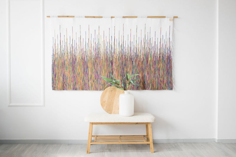 Rainbow large handwoven colourful wall hanging in vivid rainbow yarn with white fringe, by Lale Studio & Shop