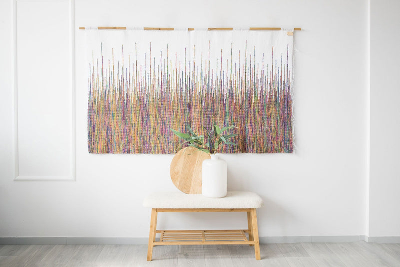 Rainbow large handwoven colourful wall hanging in vivid rainbow yarn with white fringe, by Lale Studio & Shop