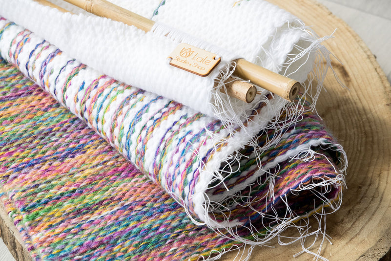 Rainbow wall hanging styled in a bright living room