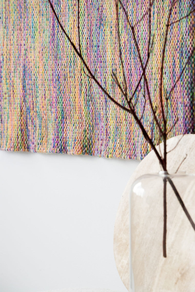 Close view of Rainbow's vibrant handwoven colour bands