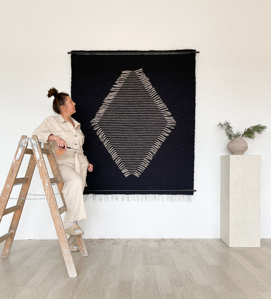 Minimalist boho Rombo Black wool tapestry, handwoven wall art from Lale Studio