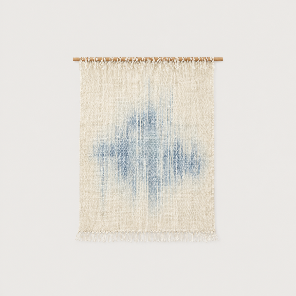 Serenity handwoven wool wall hanging, raw white with blue dip-dye on bamboo rod, packshot, Lale Studio & Shop