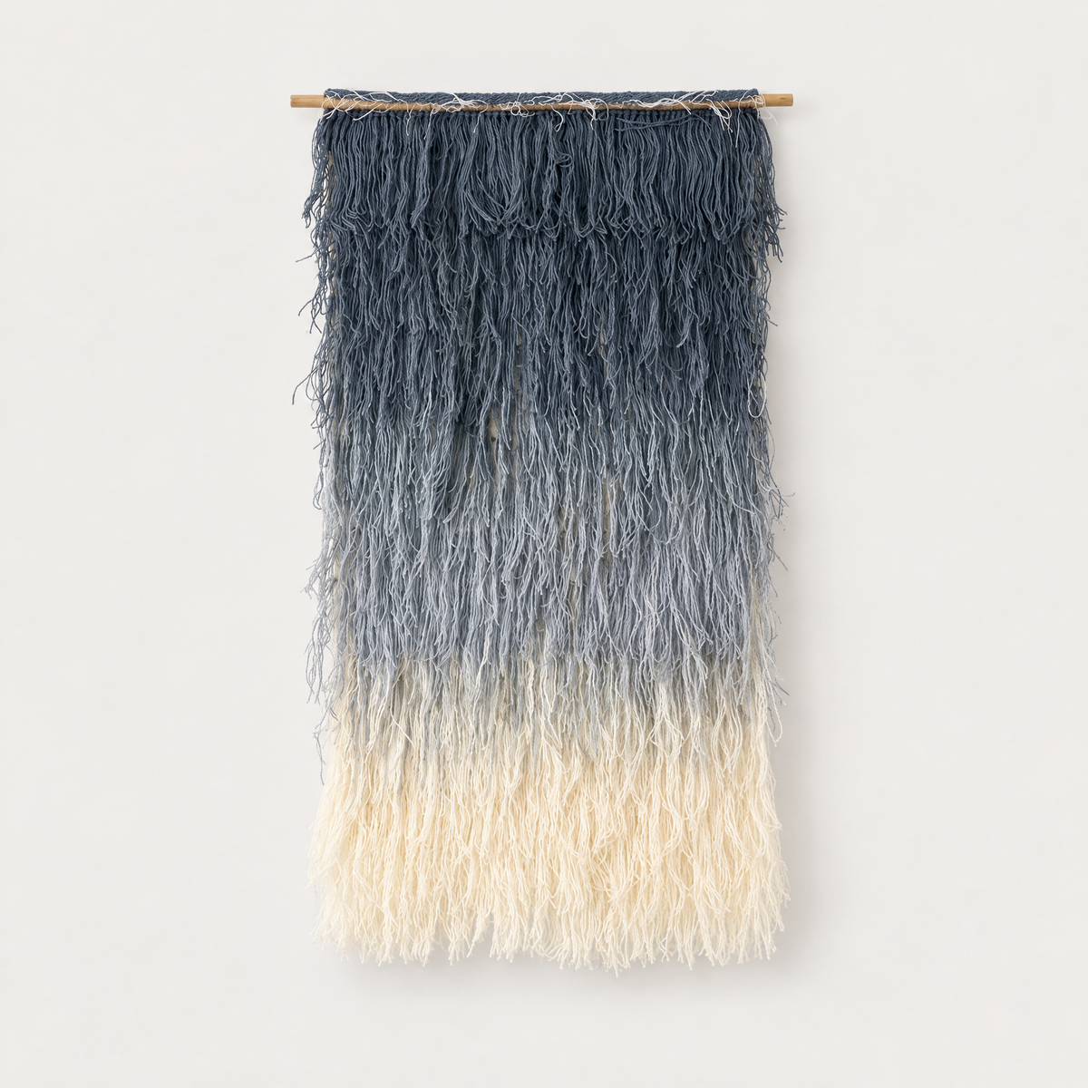 Snow shaggy handwoven wool wall hanging with navy to cream gradient on a bamboo rod, Lale Studio & Shop