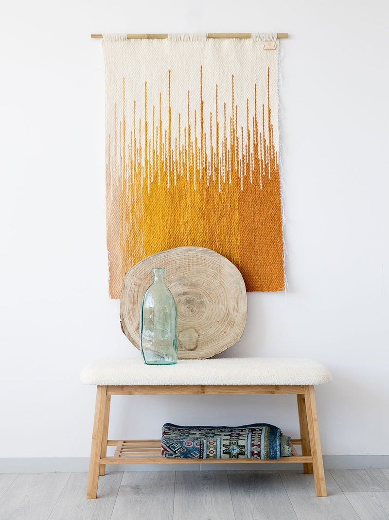 Sune handwoven wool wall hanging in an orange to yellow sunset gradient with flowing fringe, by Lale Studio & Shop