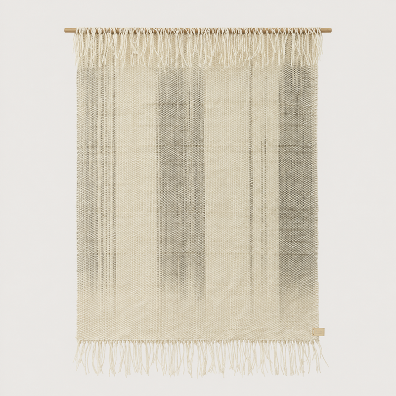 Surge handwoven wool wall hanging in natural beige with grey dip dye gradient and bottom fringe on a bamboo rod, Lale Studio & Shop
