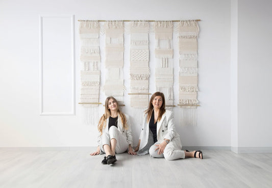 Teide 5 wall tapestry featuring five handwoven cotton panels in natural beige tones, suspended on a bamboo rod, styled in a minimalist interior by Lale Studio & Shop.