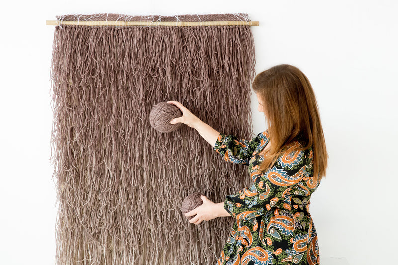 Detail of Tiramisu's shaggy two-ply wool pile in warm brown tones