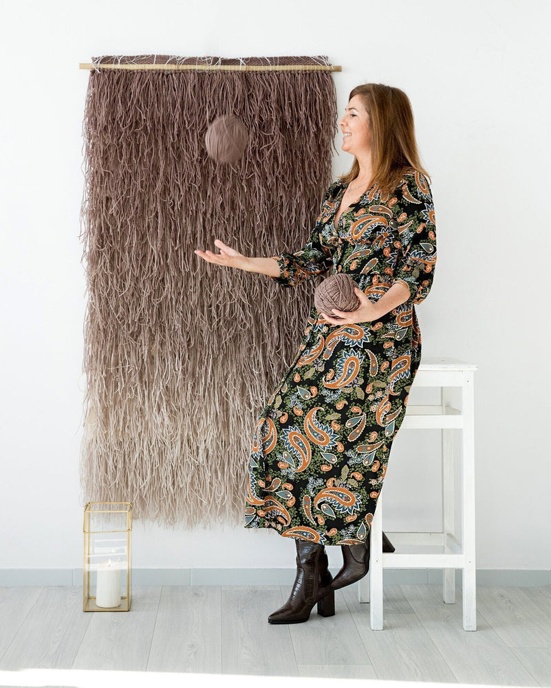 Tiramisu tapestry on a neutral wall, boho interior