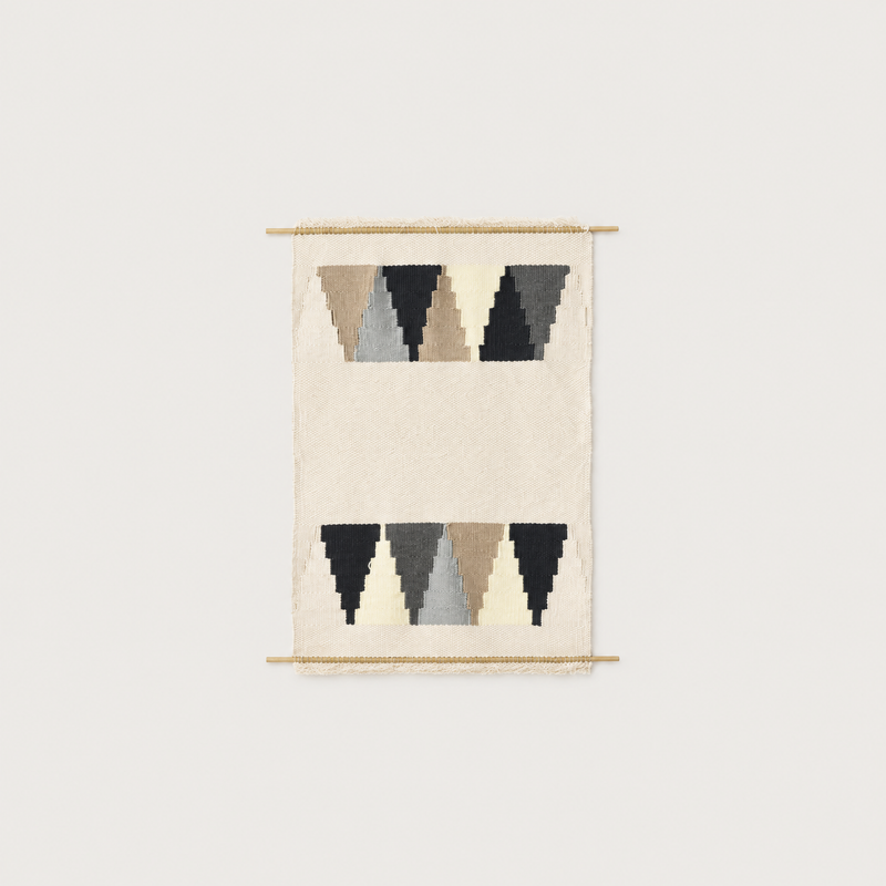 Triangul handwoven wool wall hanging with triangle pattern in grey, beige and black on bamboo rod, packshot, Lale Studio & Shop