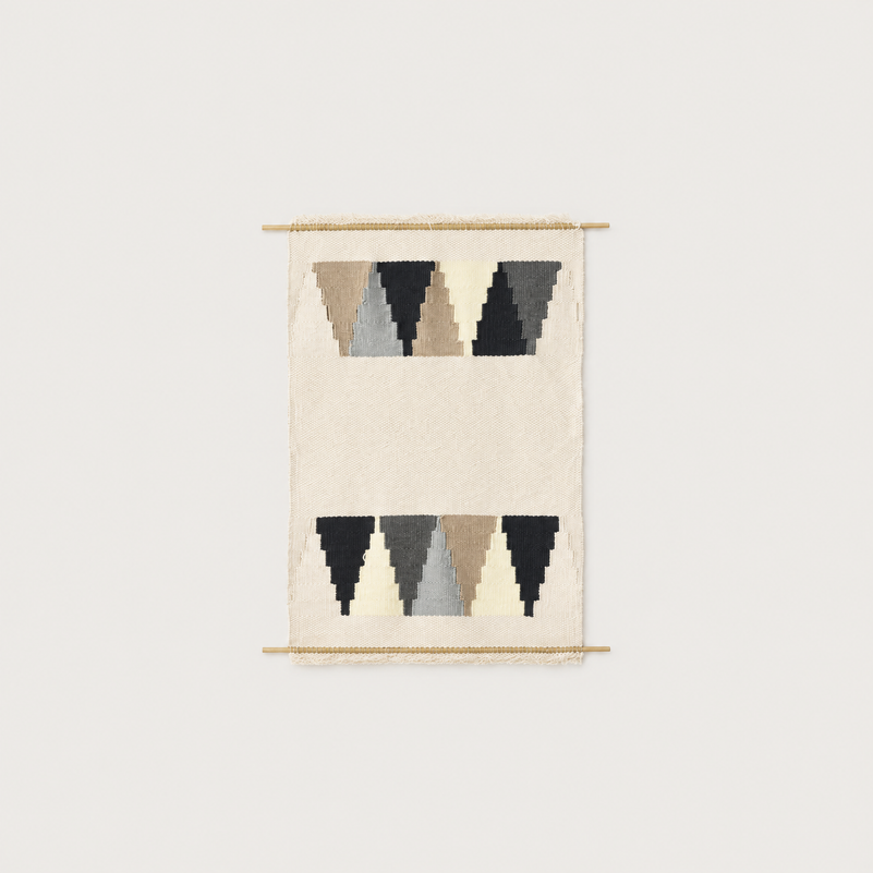 Triangul handwoven wool wall hanging with triangle pattern in grey, beige and black on bamboo rod, packshot, Lale Studio & Shop