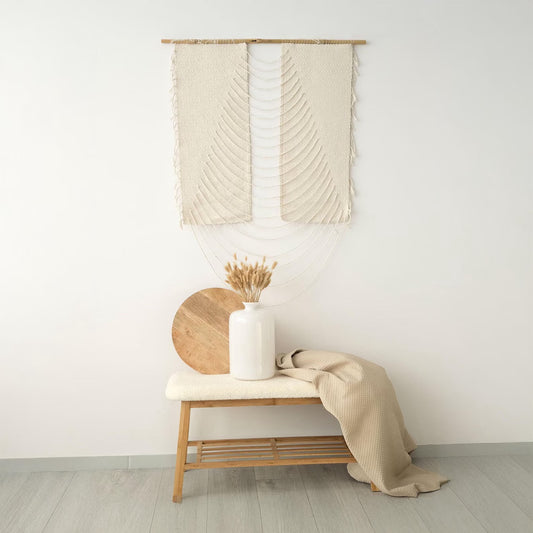 Urania Natural handwoven macrame wall hanging in rustic natural tones. A beautifully crafted fiber art piece made with natural cotton, ideal for adding warmth and charm to boho, rustic, or minimalist interiors.