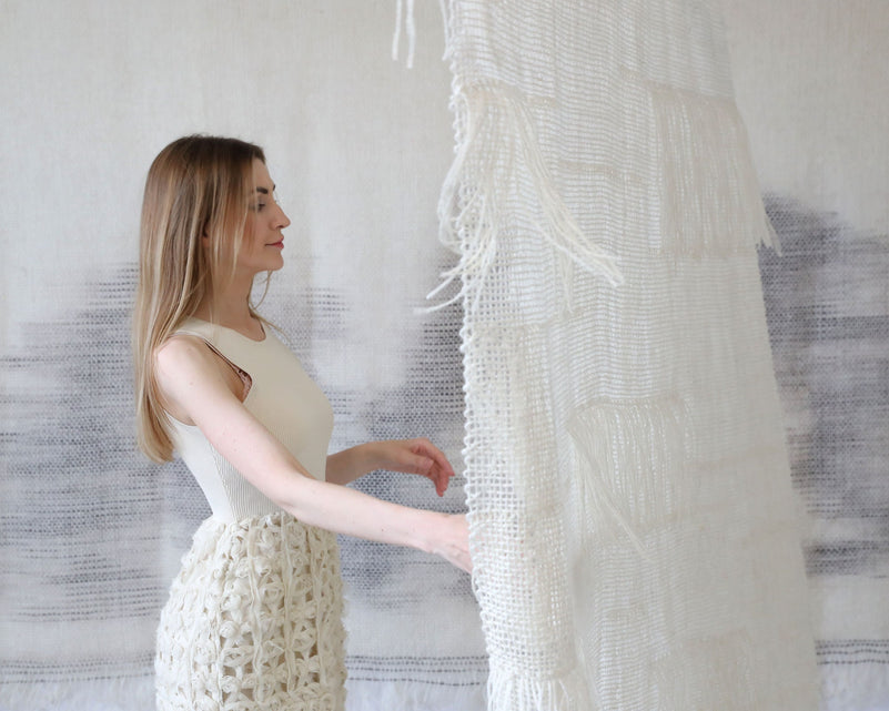 Vapour wall hanging full length on a slim bamboo rod