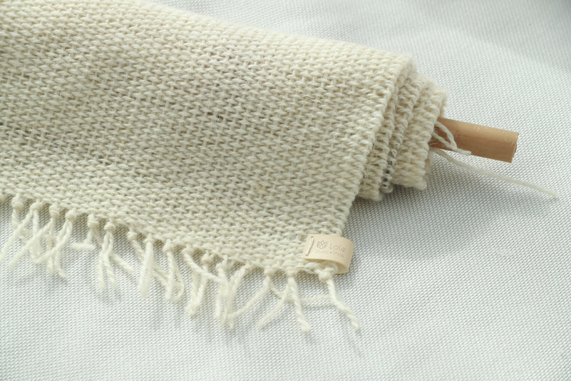 Detail of Veil's hand-dyed wool weave and layered texture