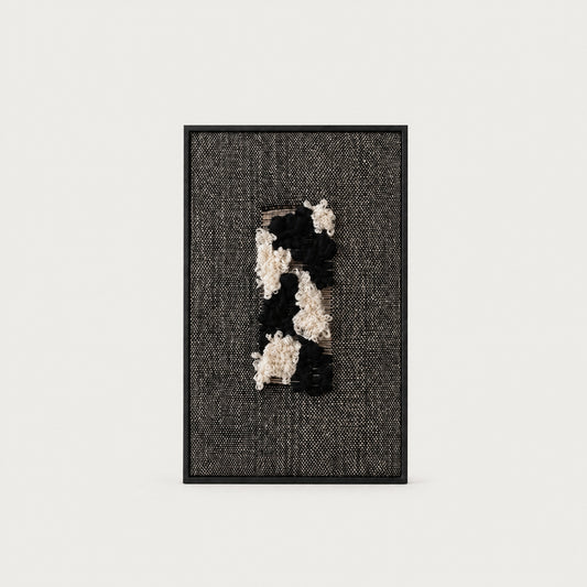 Velmono black and white handwoven wool tapestry in a solid black wooden frame, monochrome textile wall art by Lale Studio & Shop