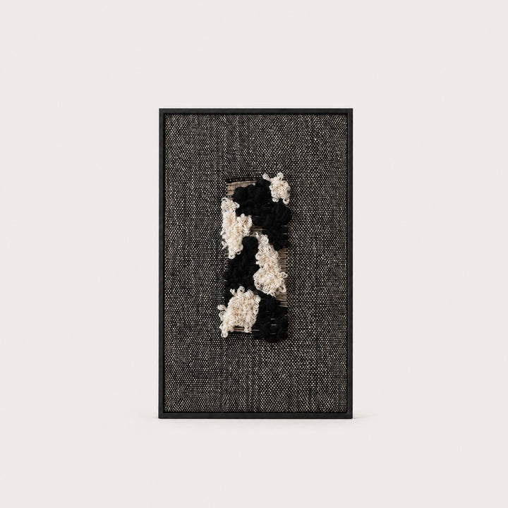 Velmono black and white handwoven wool tapestry in a solid black wooden frame, monochrome textile wall art by Lale Studio & Shop