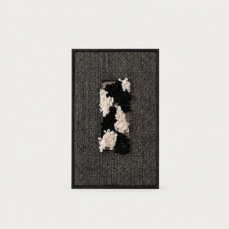 Velmono black and white handwoven wool tapestry in a solid black wooden frame, monochrome textile wall art by Lale Studio & Shop
