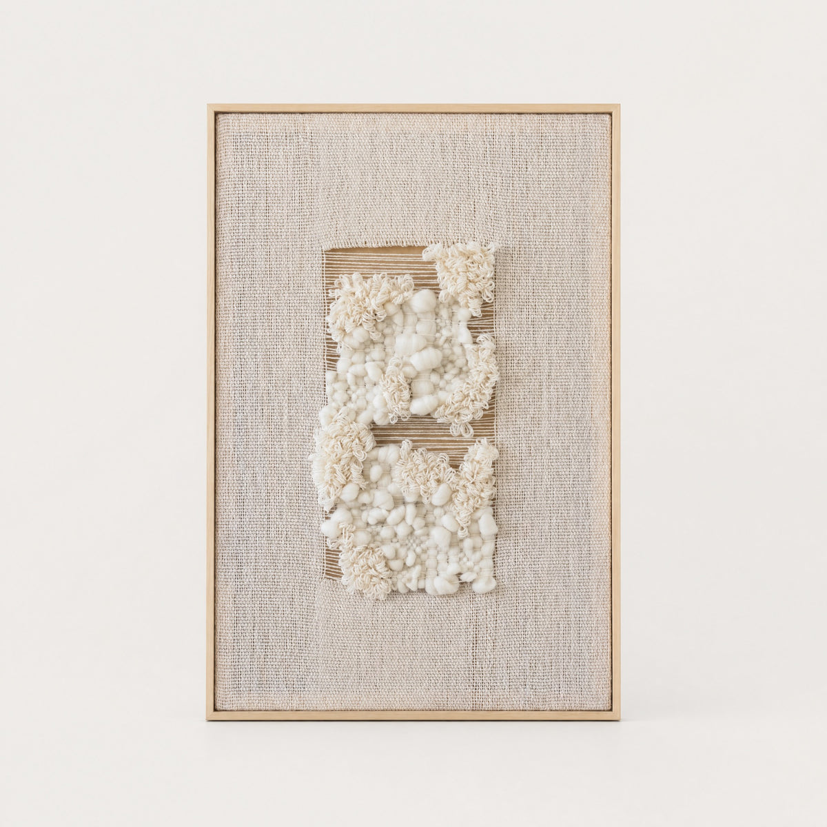 Velua handwoven wool tapestry in raw white with a solid pine frame, modern framed textile wall art by Lale Studio & Shop