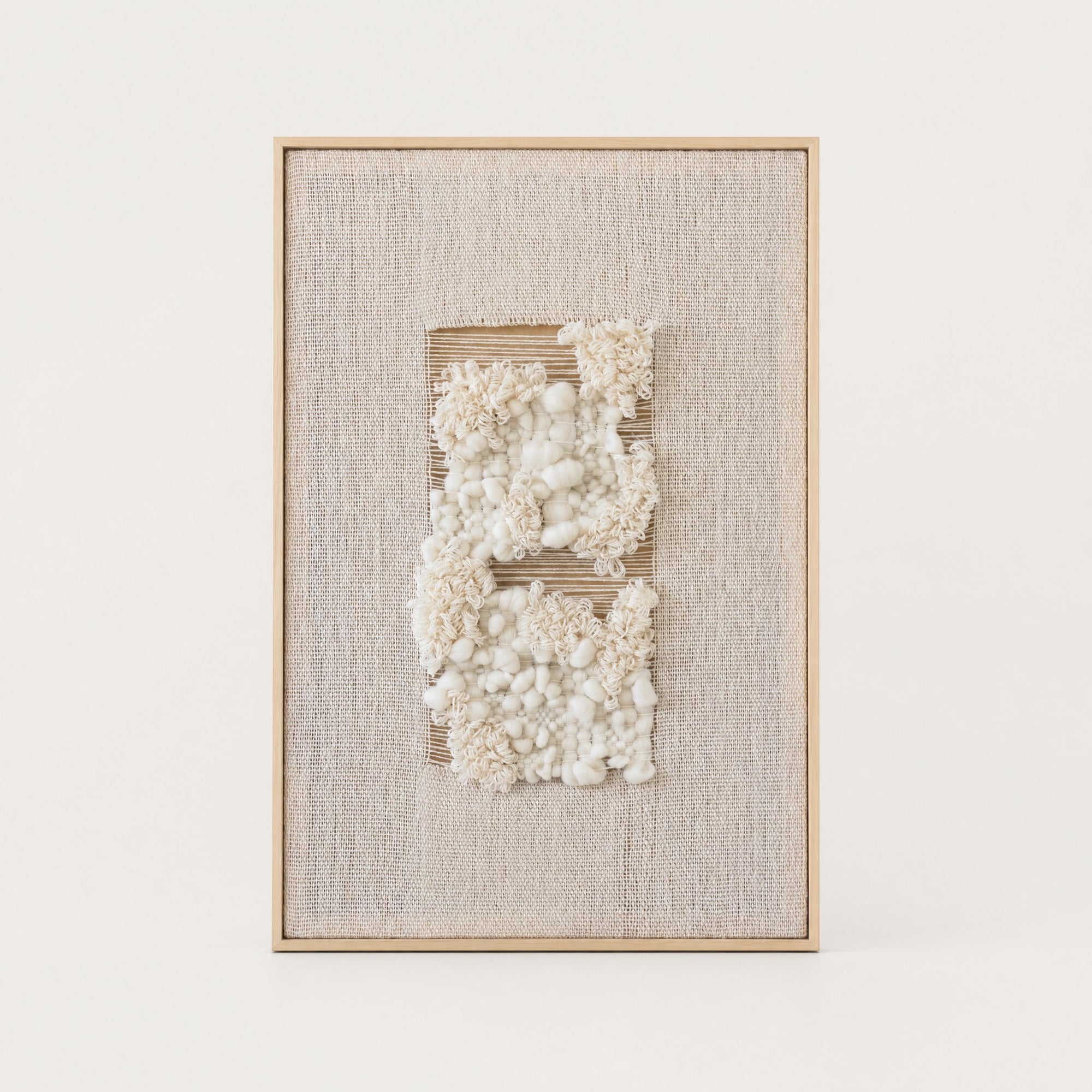 Velua handwoven wool tapestry in raw white with a solid pine frame, modern framed textile wall art by Lale Studio & Shop