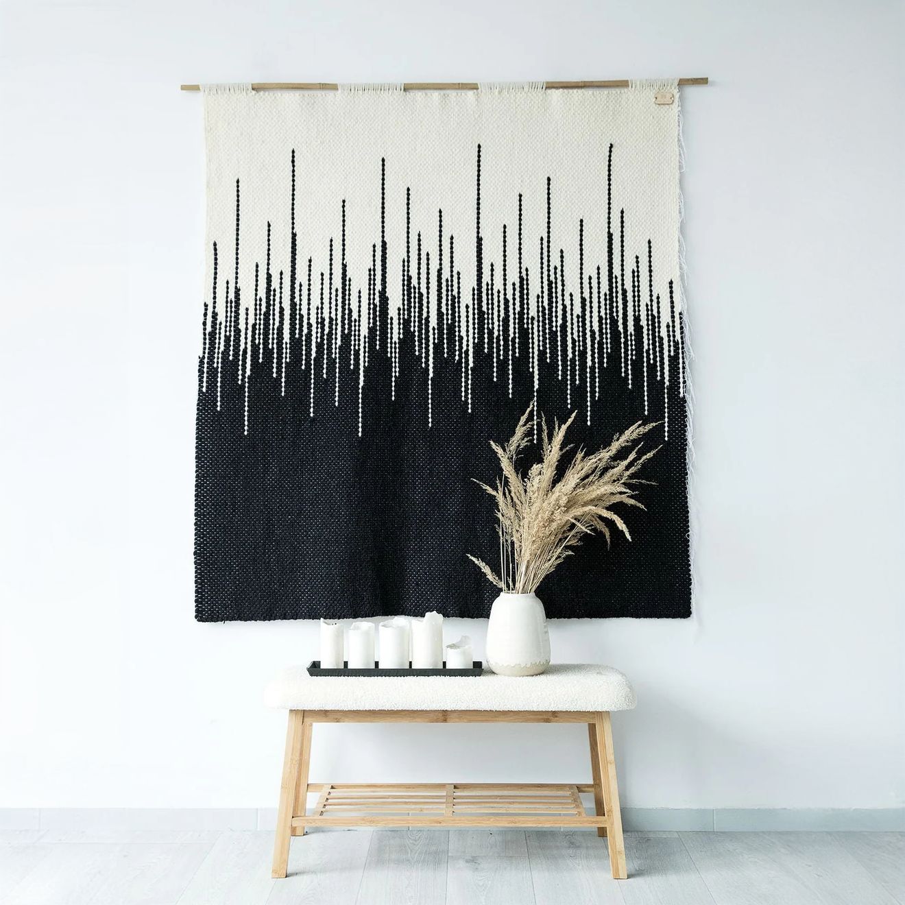 Zebra handwoven wall tapestry featuring a bold black and beige zigzag geometric design, crafted from natural wool and mounted on a bamboo rod. Perfect for Japandi, Scandinavian, and modern interiors.