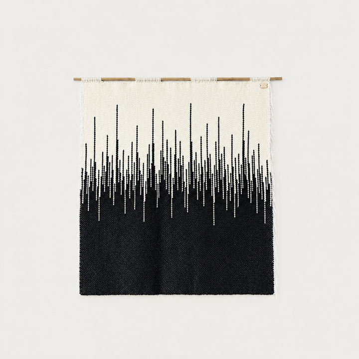 Zebra handwoven wool wall hanging, black and natural beige on bamboo rod, packshot, Lale Studio & Shop