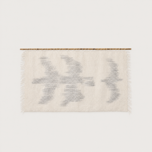 Zeva handwoven wool wall hanging with bird silhouettes on bamboo rod, packshot, Lale Studio & Shop